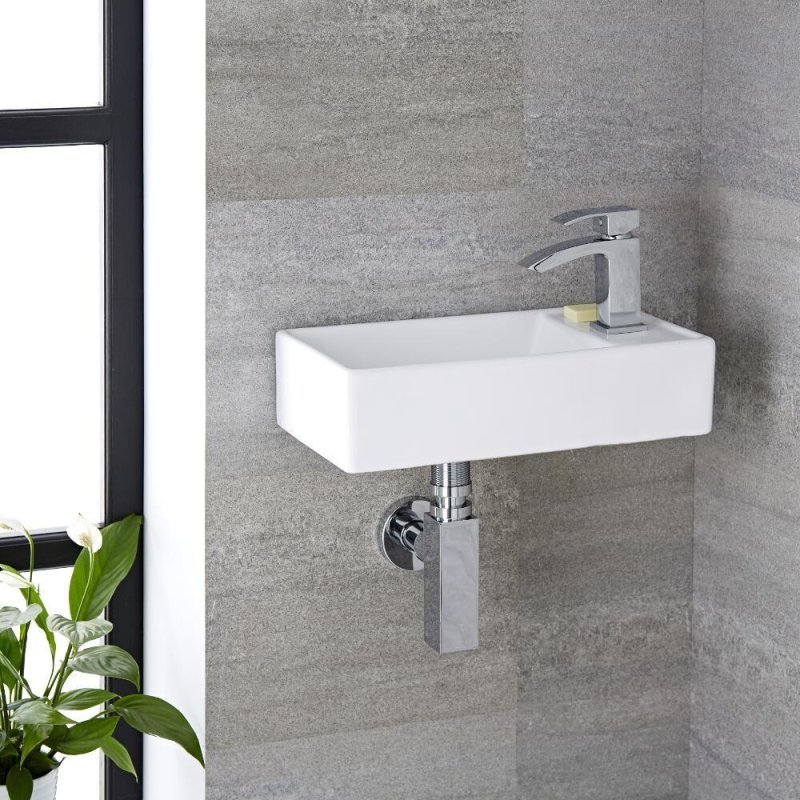 Small wash basin design for a compact powder room