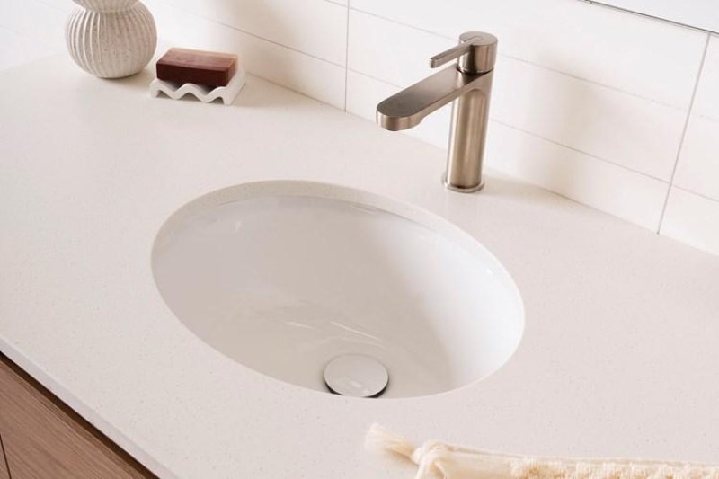 Top counter wash basin design with a raised rim above the countertop